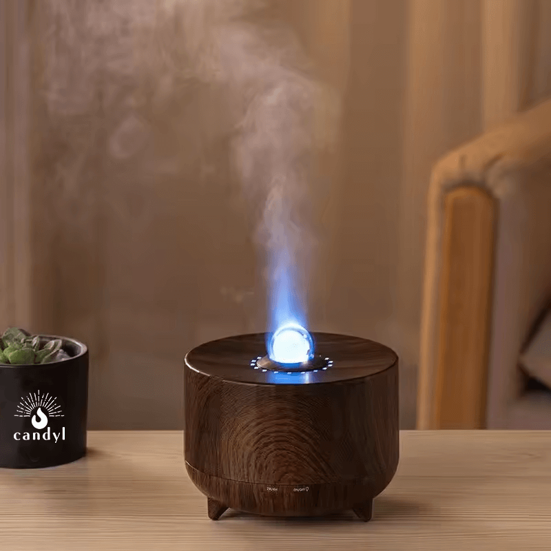 Oracle Crystal Ball Flame Essential Oil Diffuser with colorful mist and wooden base, creating a soothing atmosphere.