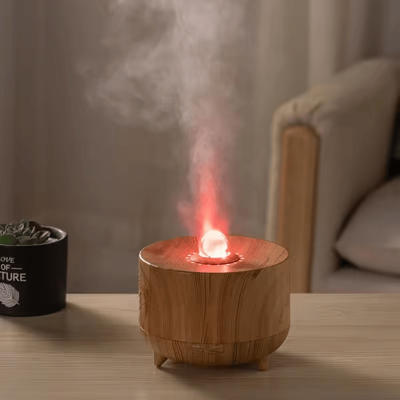 Oracle Crystal Ball Flame Essential Oil Diffuser with red light and aromatic mist.