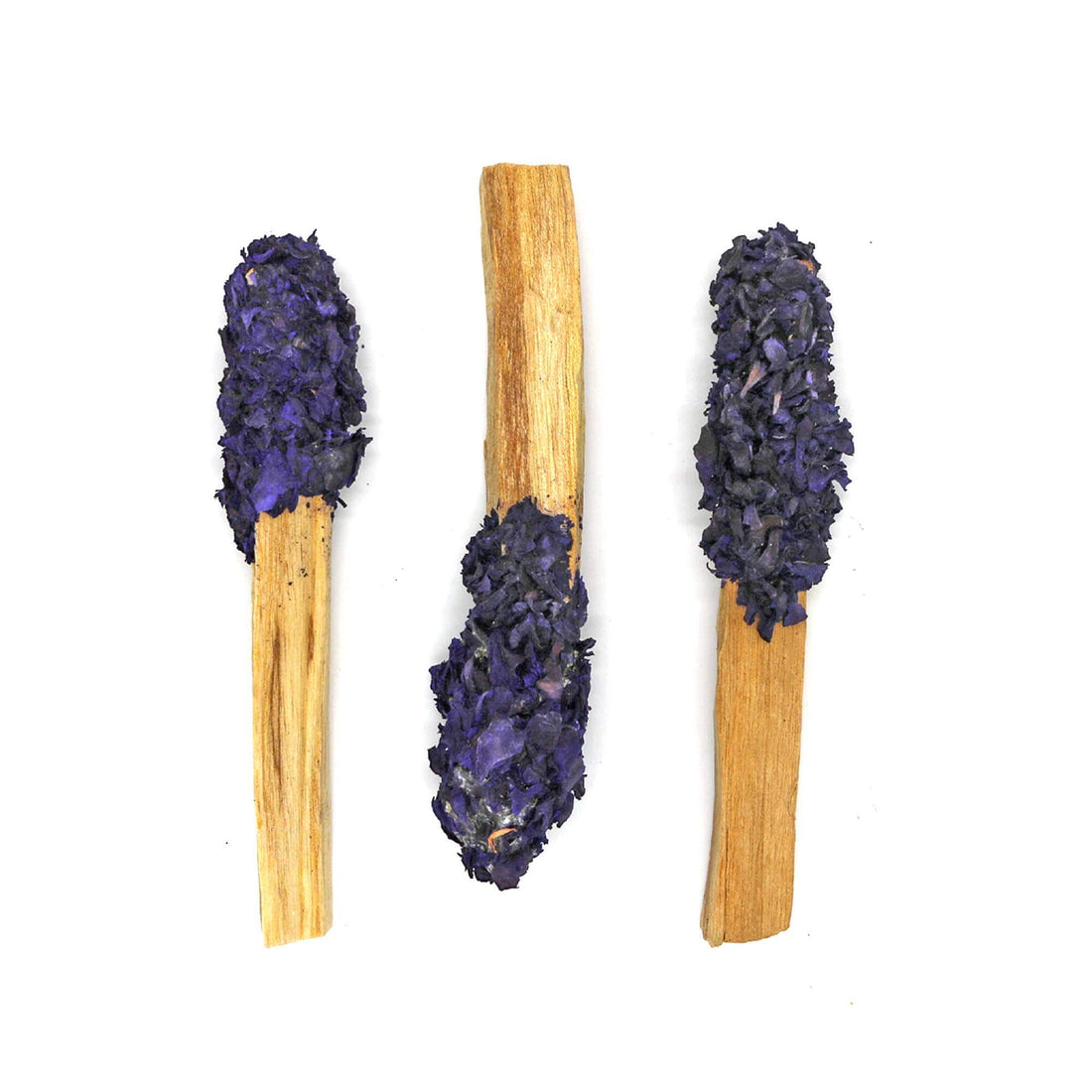 Palo Santo Pops with herbs and resins, offering therapeutic benefits and unique aroma for smudging.