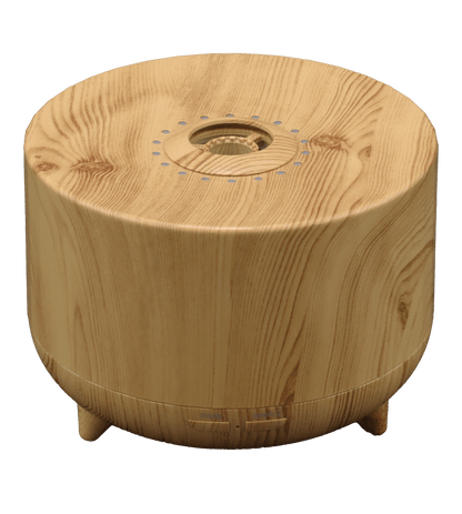 Wooden essential oil diffuser with a natural finish and simple design, perfect for enhancing any room.