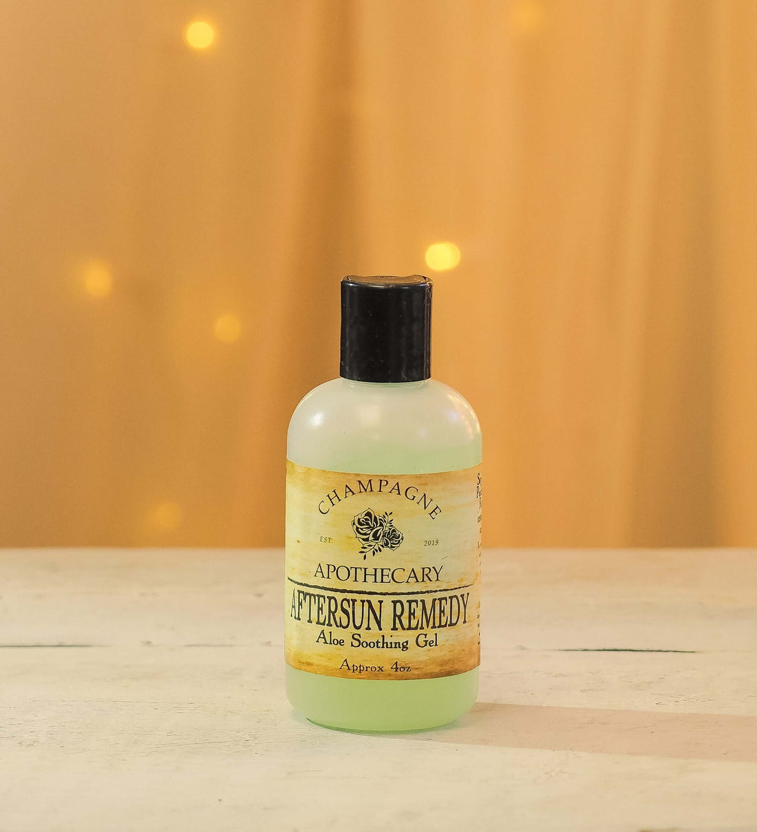 Champagne Apothecary Aftersun Remedy Aloe Relief Gel bottle for soothing sunburn and skin hydration.
