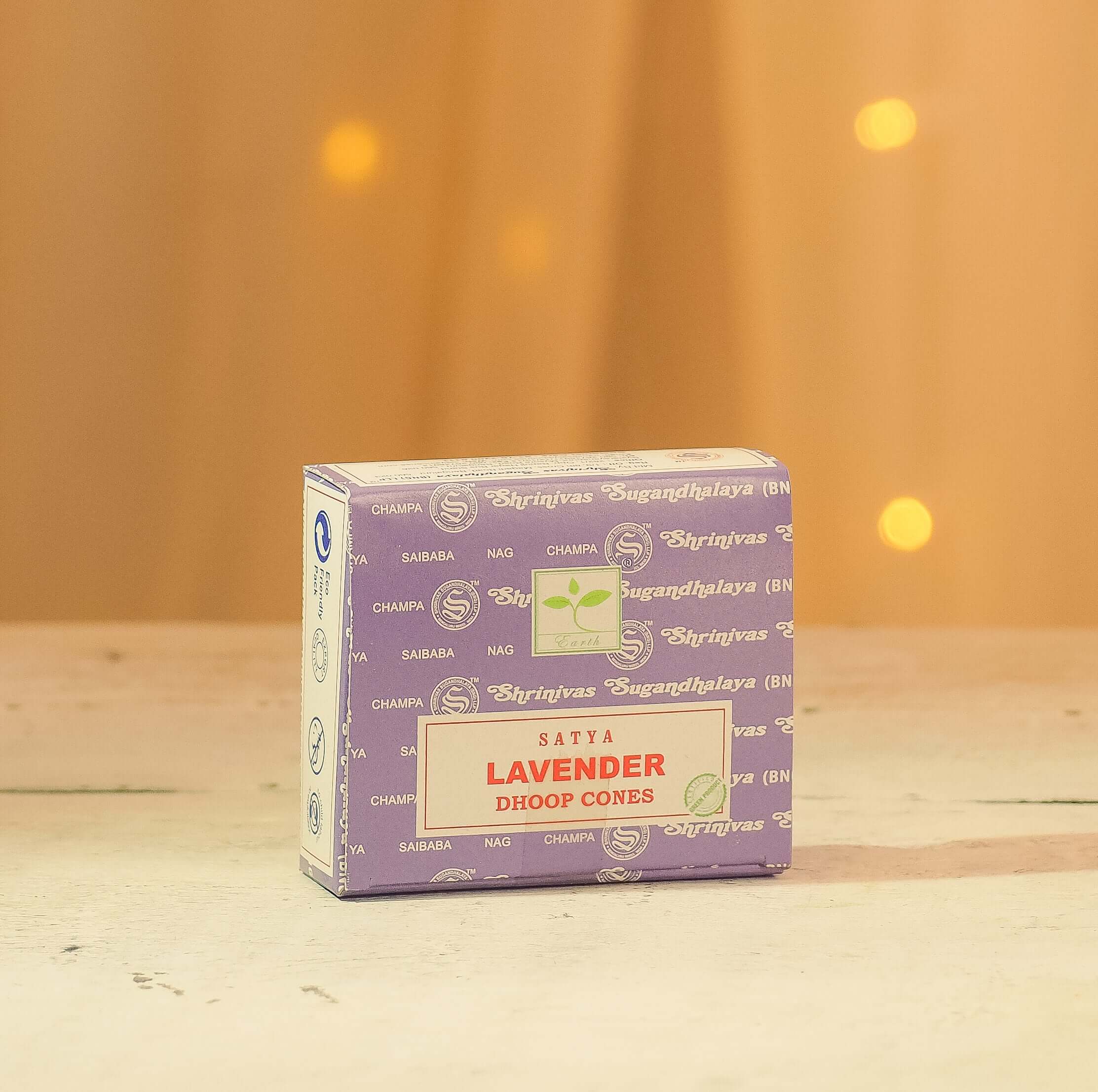 Satya Lavender Dhoop Cones pack on a wooden surface, ideal for natural fragrance and relaxation.