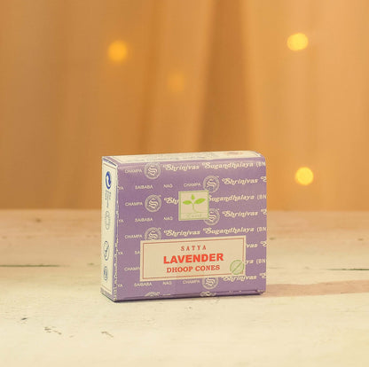 Satya Lavender Dhoop Cones pack on a wooden surface, ideal for natural fragrance and relaxation.