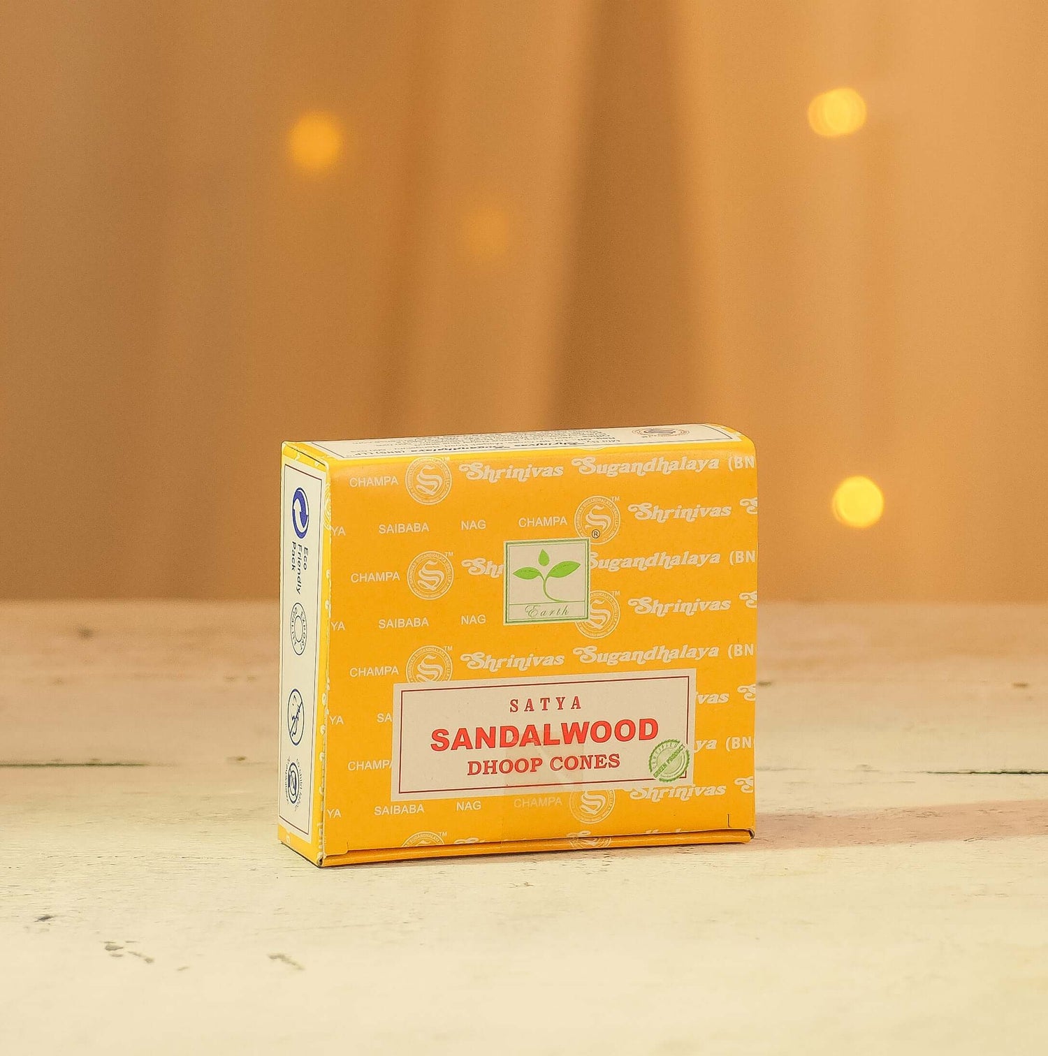 Satya Sandalwood Dhoop Cones pack on display, made from all-natural ingredients for a pleasant aroma.